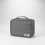 CordNest Travel Tech Organiser open showing cable and charger compartments
